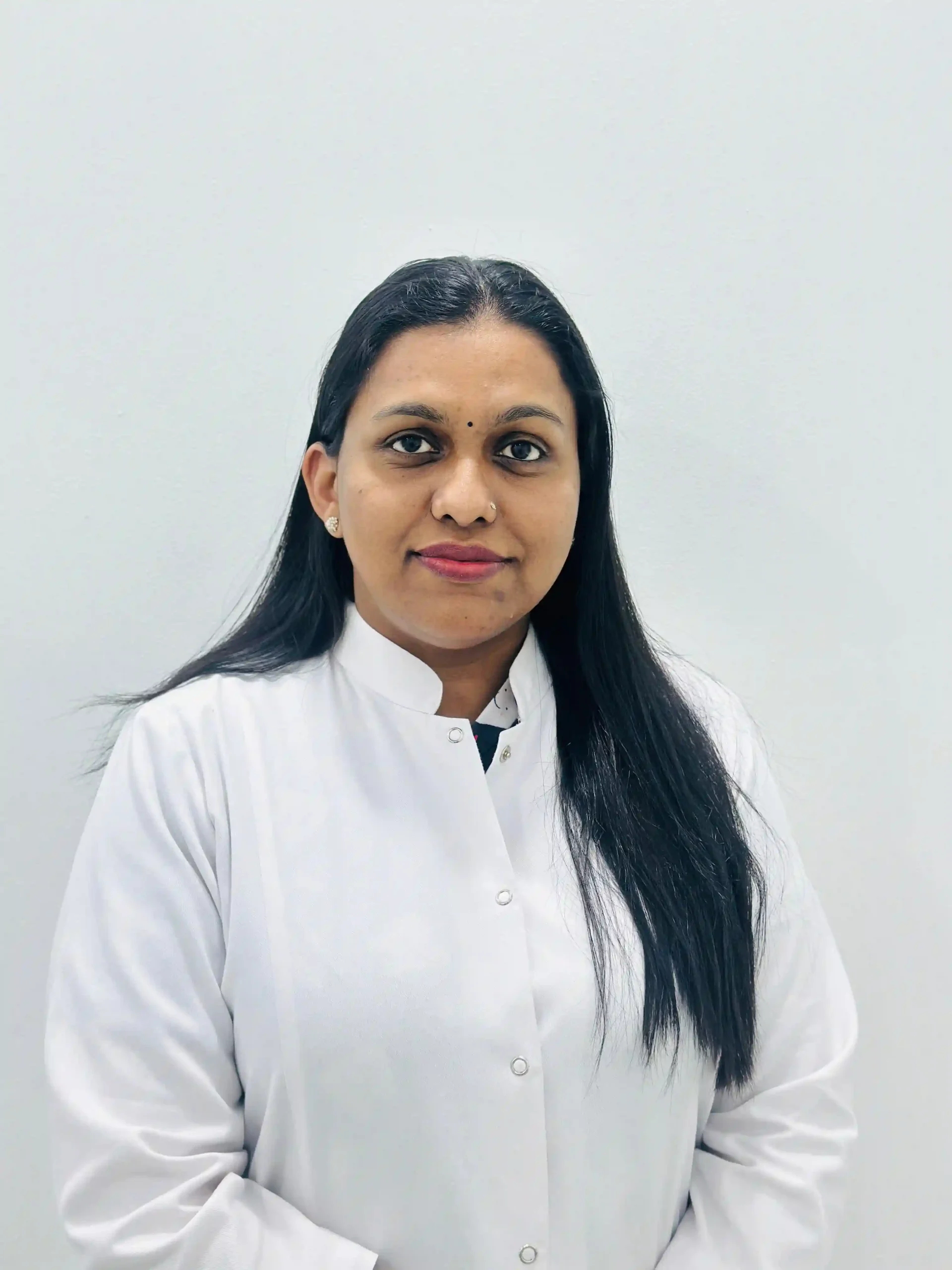 Dr. Asha Nair